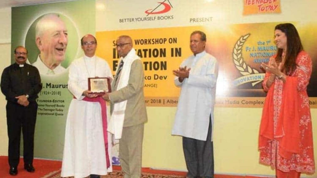 Dr. Jagdish Gandhi, Founder of City Montessori School, receiving award