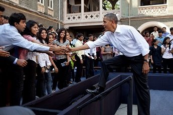 Ex-President Barack Obama greets students 